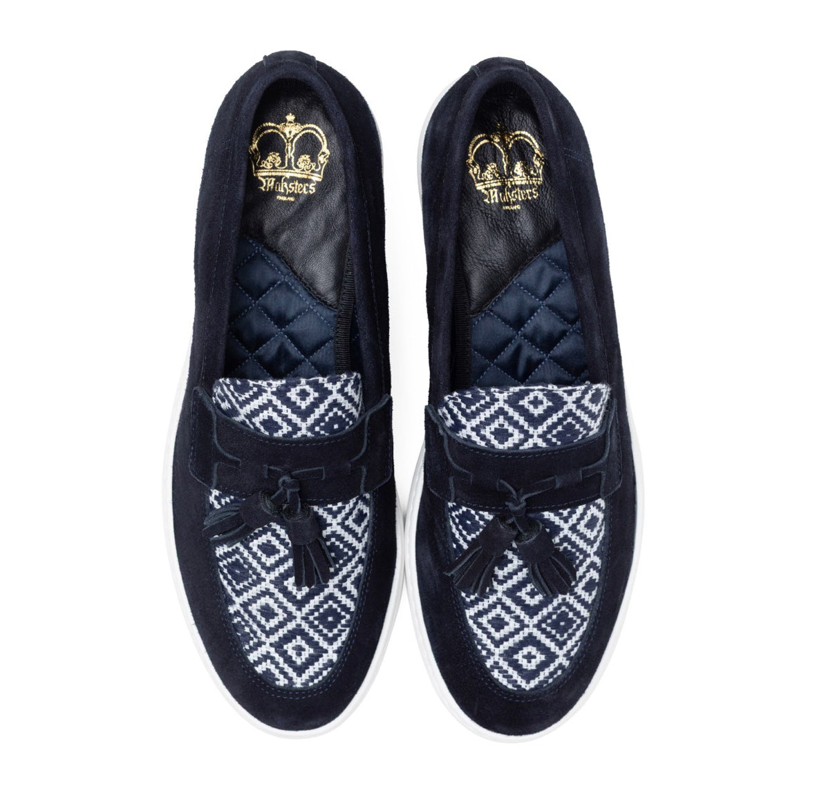 Pair of navy suede loafers with white geometric pattern on a white background top view 